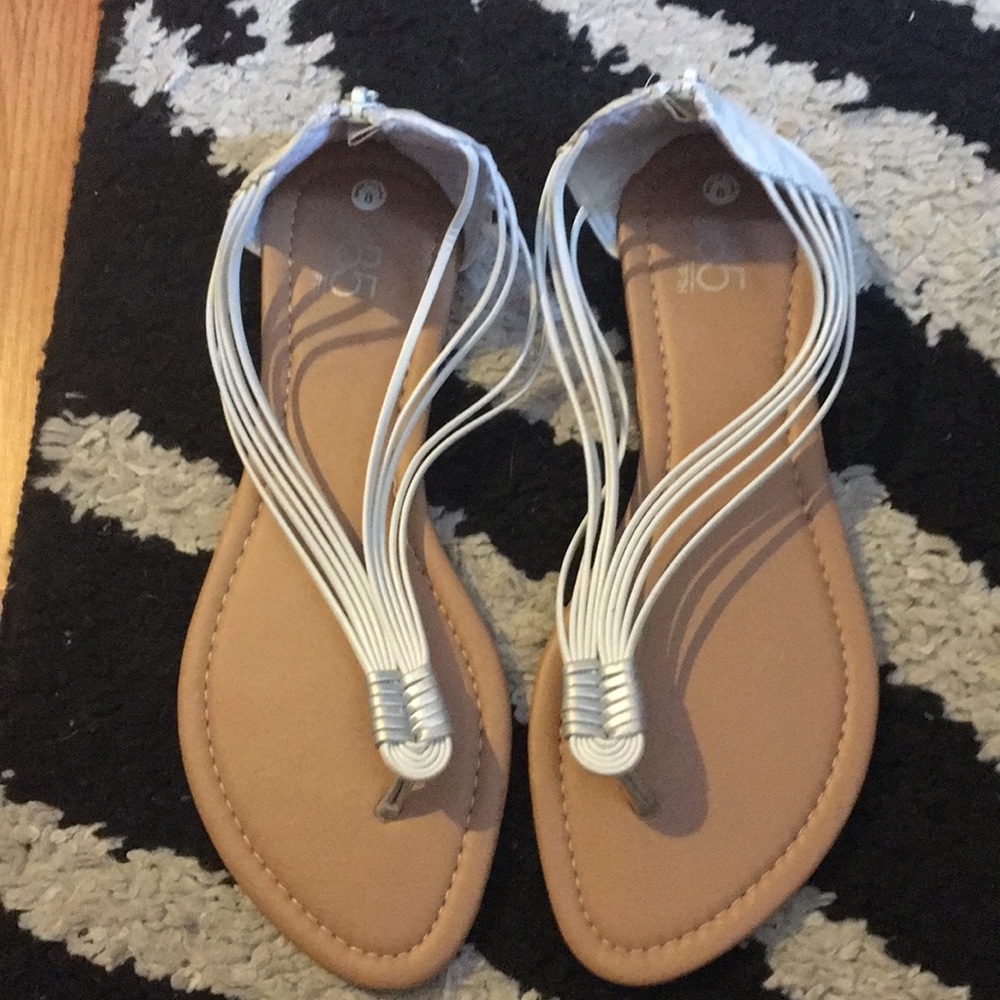 White and tan sandals